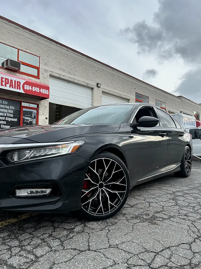 Grey Honda sedan on black mesh wheels